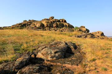 Fototapeta na wymiar old stones in steppe