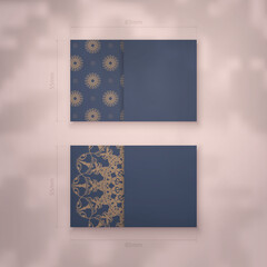 Business card template in blue with vintage brown pattern for your brand.