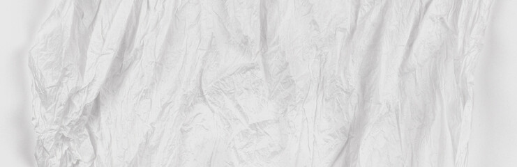 Crumpled white tissue paper on white