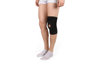 Knee Support Brace on leg isolated on white background. Orthopedic Anatomic. Braces for knee...