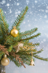 Fototapeta na wymiar Christmas holiday.Festive winter background with golden decor on fir branches.Christmas and New Year concept. Christmas long banner with copy space.