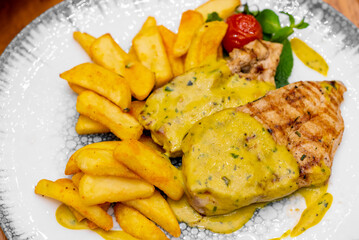 Fried, juicy, tender chicken fillet with French fries. Recipes, Steaks