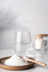 selective focus. food supplement collagen in the form of powder for dissolving in water. natural composition. benefits for the face and body