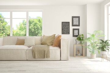 White living room with sofa and summer landscape in window. Scandinavian interior design. 3D illustration