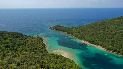 Fototapeta premium Aerial drone photo of beautiful paradise bay in tropical exotic island with turquoise crystal clear sea