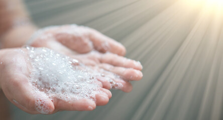 hand hold bubbles in palm with light