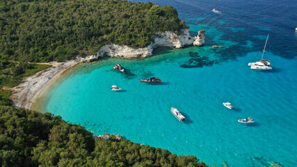 Aerial drone photo of paradise white rocky bay and beach in island of Antipaxos, Ionian, Greece