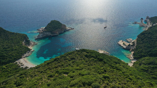 Aerial drone photo of paradise white rocky bay and beach in island of Antipaxos, Ionian, Greece