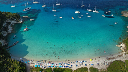 Fototapeta na wymiar Aerial photo of luxury sail boat anchored in tropical Caribbean rocky turquoise colour seascape