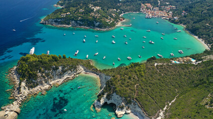 Aerial drone photo of paradise bay and village of Laka visited by yachts and sail boats, island of...