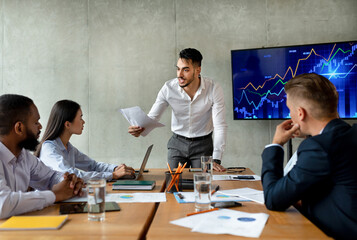 Business Failure. Young Middle Eastern Boss Shouting At Employees During Corporate Meeting