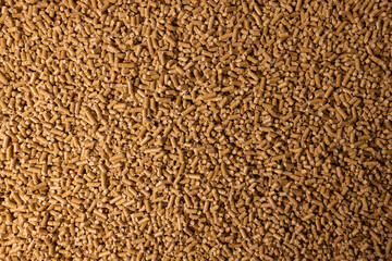 wood pellets background. biomass biofuel