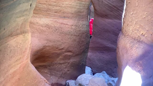 Hiking through slot canoyn in Utah