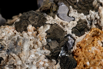 Macro stone mineral Galena on a black background