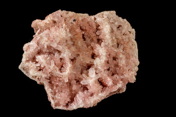 Macro stone mineral pink quartz amethyst on a black background