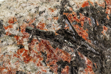 Macro of a stone Stibnite mineral on a white background