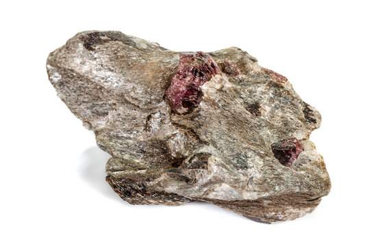 Macro stone Garnet mineral in rock on a white background