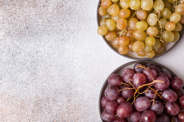 Grapes on a light background. Fresh fruit. Dieting and healthy eating. Copy space