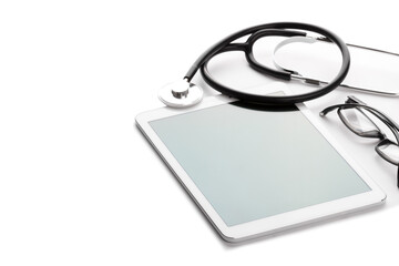 Black stethoscope and tablet over white background space for text