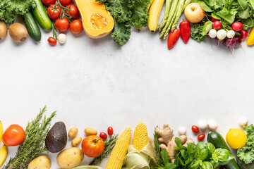 Healthy food: Fish, corn, nuts, asparagus, avocado, tomatoes, spinach, flax, potatoes, radishes, bread, bananas, lettuce leaves. The concept of dietary nutrition. Top view.