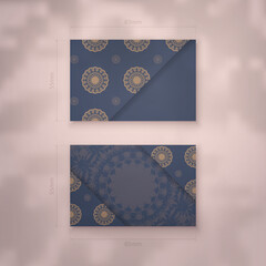 Presentable business card in blue with brown mandala ornament for your business.