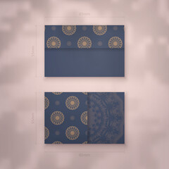 Presentable business card in blue with brown mandala ornaments for your personality.