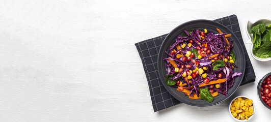 Homemade Purple Cabbage Salad with Corn, Carrots, Pomegranate and Spinach