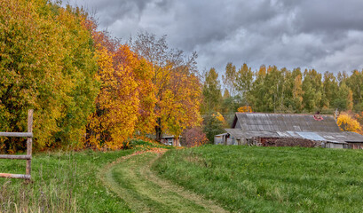 Fenced ranch, country estate and farm on autumn day