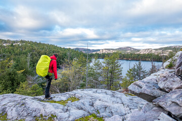 Back packer on the LaCloche Trail  Killarney Provincial Park in Ontario,  Shot in late November