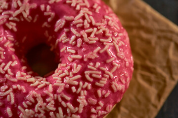 Pink doughnut on a kitchen black board