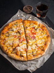 Appetizing pizza, cut into pieces. Italian food, natural ingredients