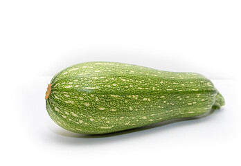 Green zucchini, ripe vegetable on a white background.