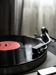 Turntable plays a vinyl record
