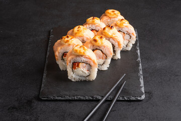 A set of sushi from many types of roles. Sushi menu. Japanese gourmet sushi.
