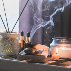 Wellness, health mental.Girl meditates yoga at home with aromatherapy palo santo Care, Wellness , meditation, spa, relax occultism, spiritual cleansing.