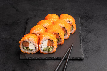 Philadelphia Sushi Rolls Set with Salmon and Cream Cheese. Japanese cuisine. Tasty food. Fish and rice.