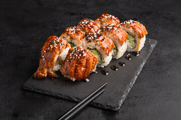 A set of sushi from many types of roles. Sushi menu. Japanese gourmet sushi.