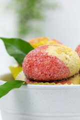 Delicious homemade round cookies with appetizing peach-shaped filling.