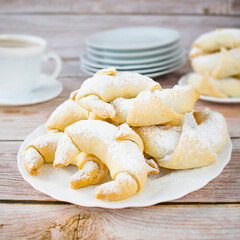 Homemade crispy croissants stuffed with plum jam.