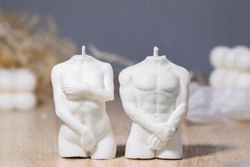 Trendy Male and Female Soy Wax Candle and Cube Bubble Candle on light background, Interior object