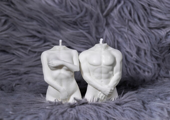 Trendy Male and Female Soy Wax Candle on soft grey background, Interior object