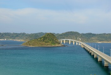 Fototapeta na wymiar 海の中を渡る一本の角島大橋