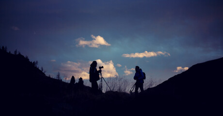 sunset on the lake's shore on dolomites