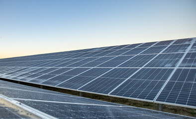 Solar panels on a construction site with raindrops on them