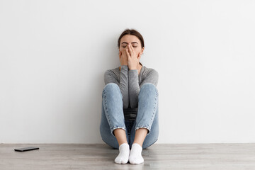 Despaired sad worried caucasian millennial female suffering from breakup, mental problems and bad...