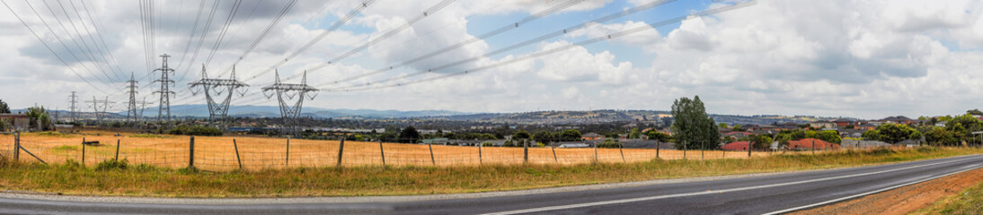 Landscape with a power line, one of the components of an electrical network, designed to transmit electricity.