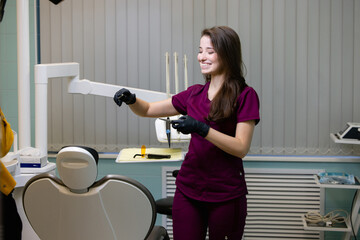 beautiful woman doctor with dental equipment in dentistry