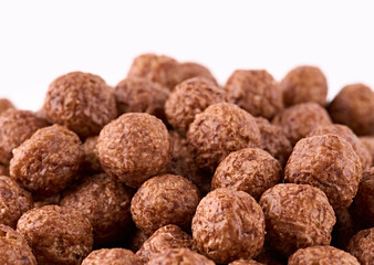 Variety of cold cereals, quick breakfast for kids overhead shot. Quick breakfast. Chocolate balls isolated on a white background. Rings isolated on a white background. 