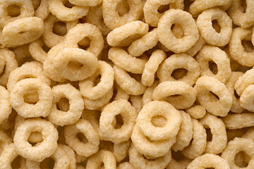 Variety of cold cereals, quick breakfast for kids overhead shot. Quick breakfast. Chocolate balls isolated on a white background. Rings isolated on a white background. 