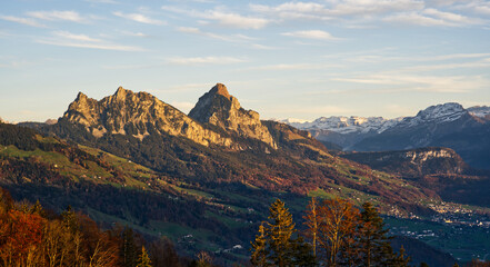 Klein Mythen and Gross Mythen peaks in sunset atmosphere